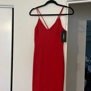 Likely red Gown with front slit❣️
